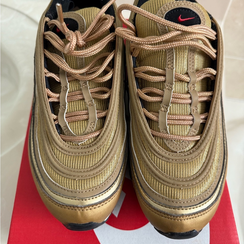 Nike Metallic Gold Sneakers with Red Accents